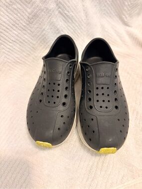 Native Shoes kids Slip-On Loafers in Black with lightening bolt and White Sole